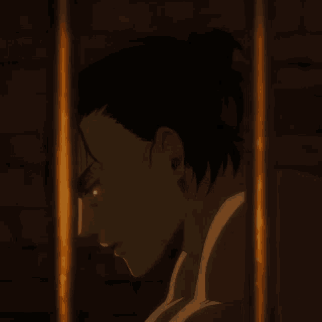 a man behind bars with his eyes glowing