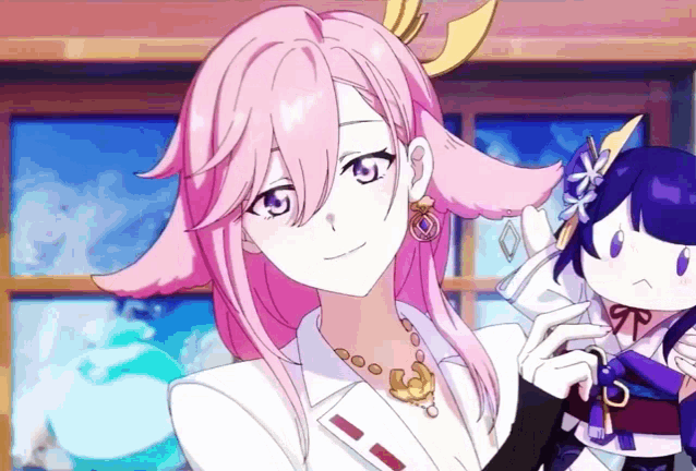 a girl with pink hair and purple eyes is standing next to a doll