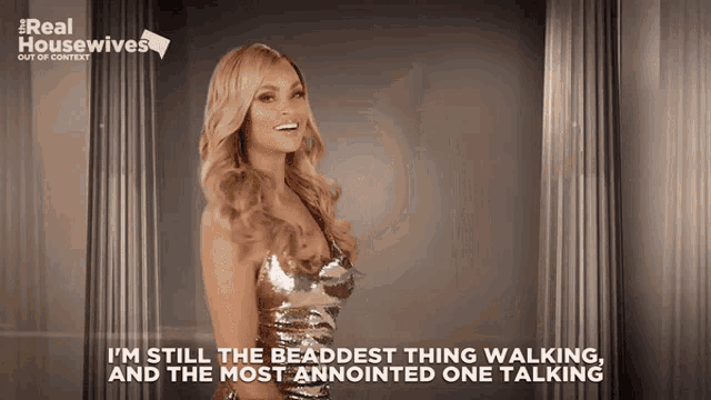 a woman in a sequined dress says i 'm still the beadest thing walking