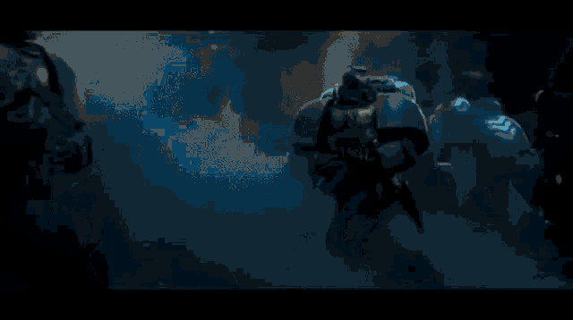 a group of soldiers are shooting their guns in the dark