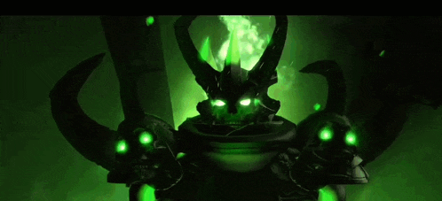 a green demon with horns is standing next to a skull and a rabbit in a dark room .