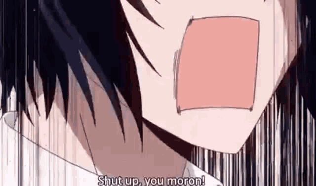 a close up of a person 's face with their mouth open and the words `` shut up , you moron ! ''