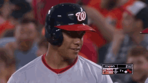 a baseball player wearing a w on his helmet