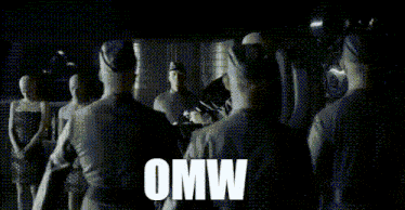 a man in a leather jacket is sitting in a chair with the word omw written on it