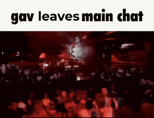 a man in a suit stands in front of a red background with the words gav leaves main chat