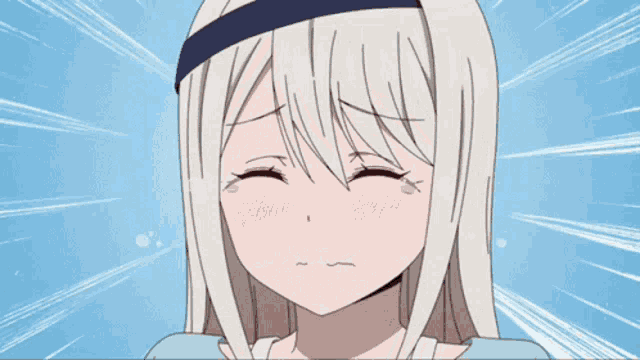 a girl with white hair is crying with her mouth wide open .
