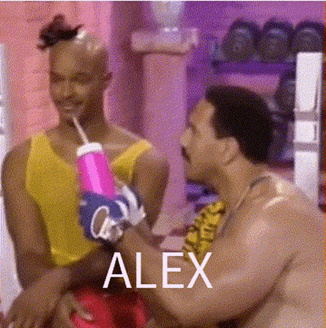 two men are sitting next to each other with the name alex on the bottom right