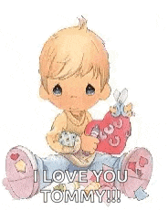 a precious moments boy is holding a heart in his hands and saying `` i love you tommy '' .