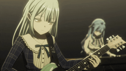 a girl is playing a guitar with a strap that says ' ec ' on it