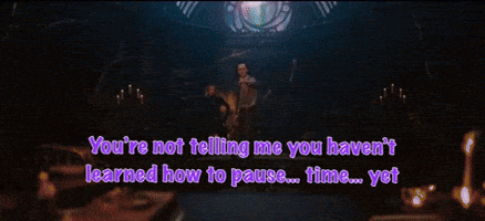 a man in a purple jacket says you 're not telling me you haven 't learned how to pause