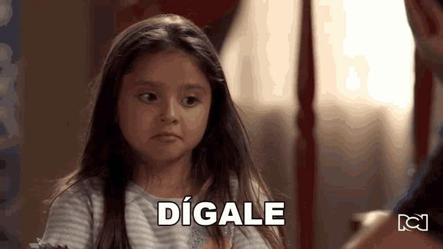a little girl with the word digale written above her