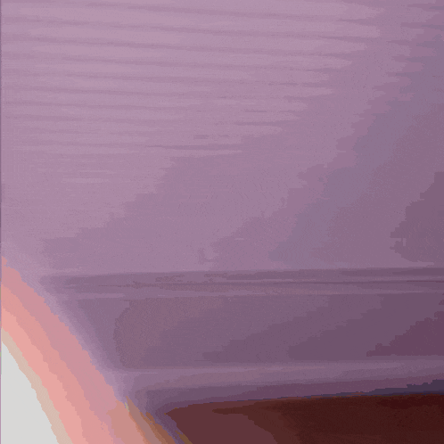 a purple background with a white border and a red stripe