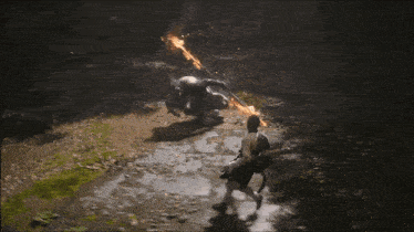 a video game is being played and a person is being attacked by another person
