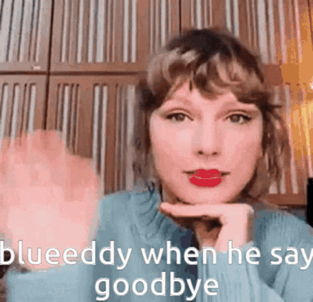a woman in a blue sweater says " blueeddy when he says goodbye "