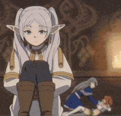 a girl with white hair and ears is sitting down with her legs crossed