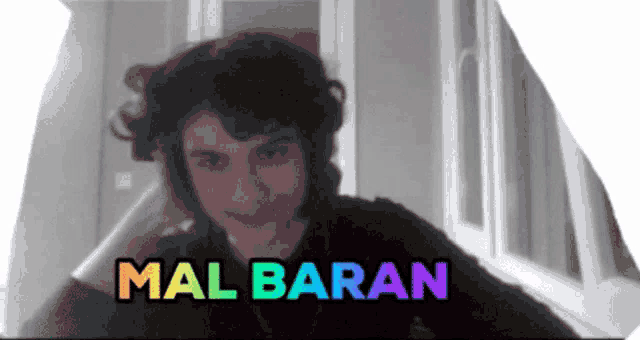 a picture of a person with the name mal baran on the bottom
