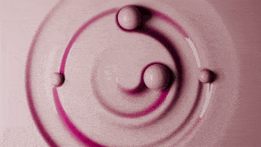 a close up of a pink liquid with a swirl in the middle