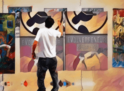 a man is working on a painting that says evolvepreneur secrets on it