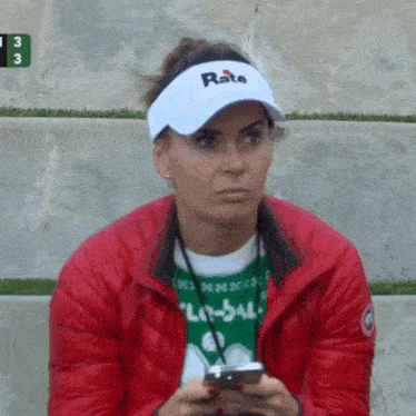 a woman wearing a white hat that says rate