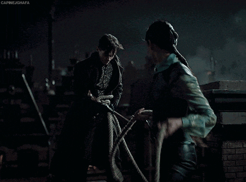 a man is holding a rope and another man is holding a rope with the caption caprinejghata