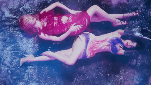 a painting of two women laying on their backs