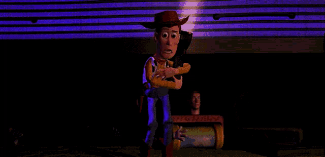 woody from toy story is holding a gun in his hand in a dark room