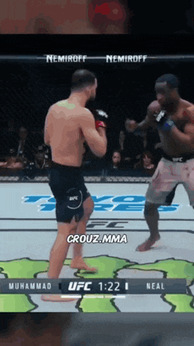 two men are fighting in a boxing ring and one of them says crouz mma