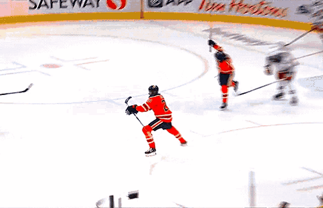 a hockey player with the number 29 on his helmet is screaming
