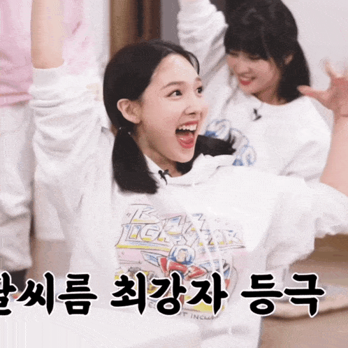 a girl wearing a white shirt that says twice