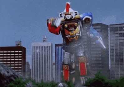 a giant robot is flying in the air in front of a city .
