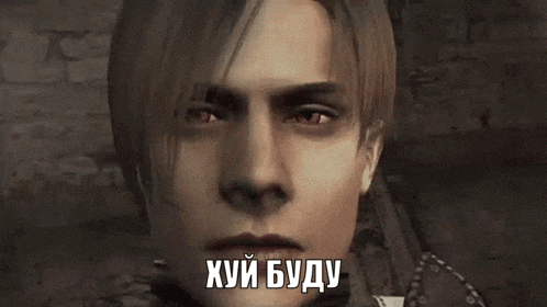 a close up of a man 's face with red eyes and a caption in a foreign language