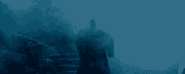 a man in a black robe is surrounded by smoke and a blue background that says python