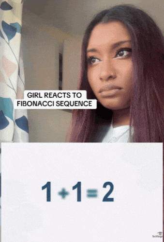 a woman with purple hair is looking at a sign that says girl reacts to fibonacci sequence
