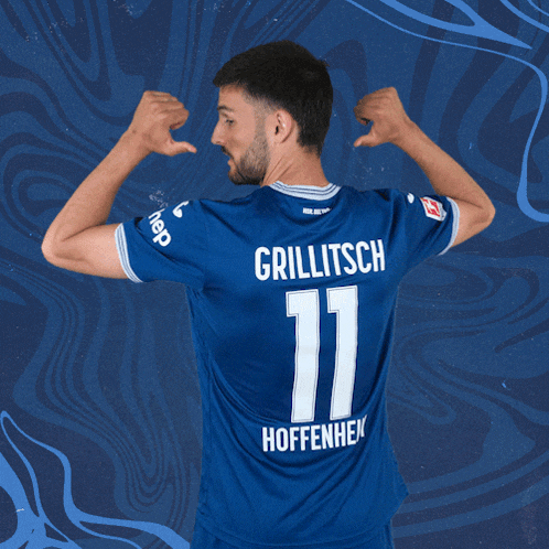 a man in a blue jersey with the name grillitsch on the back