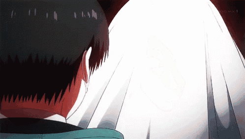 a close up of a person 's back with a white cloth covering it
