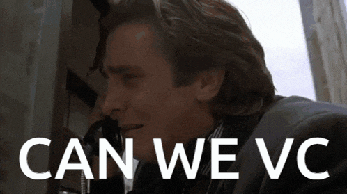 a man talking on a phone with the words " can we vc " written below him