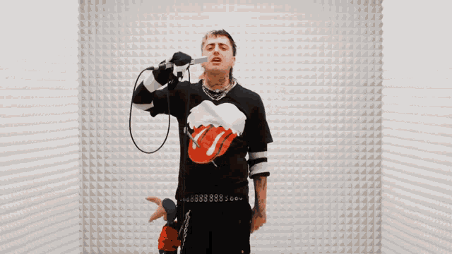a man is singing into a microphone and the word gallery is on the bottom