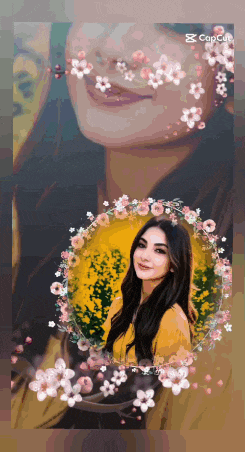 a woman in a yellow shirt is surrounded by flowers and the caption says cap cut
