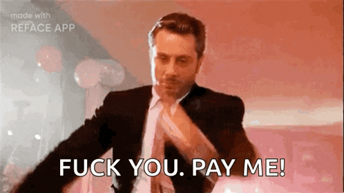 a man in a suit and tie is dancing and saying `` fuck you , pay me ! ''