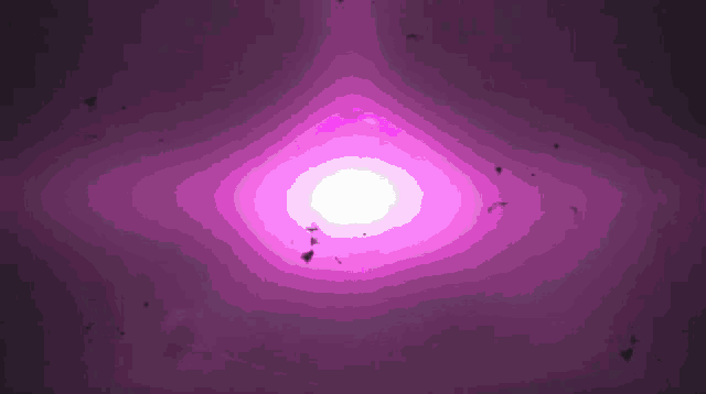 a purple background with a white light coming out of it
