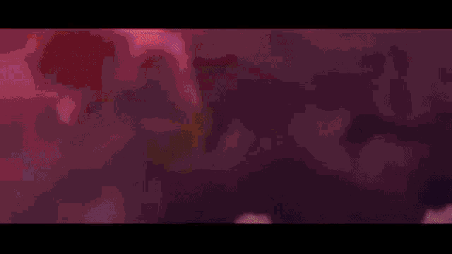 a close up of a fire with a black background .