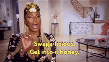 a woman wearing a gold crown says swagalicious get into it honey