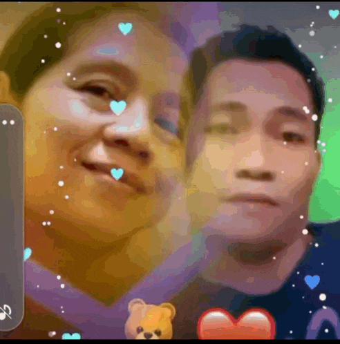 a man and a woman are posing for a picture with hearts around them