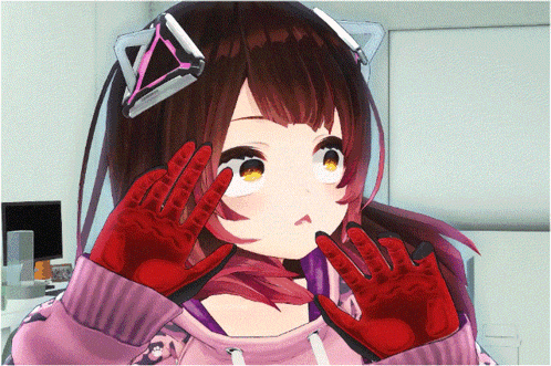 a girl with red gloves on her hands is making a face