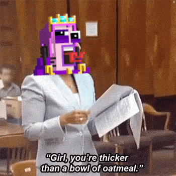 a woman in a suit is standing in a courtroom holding a piece of paper and a cartoon character on her head .