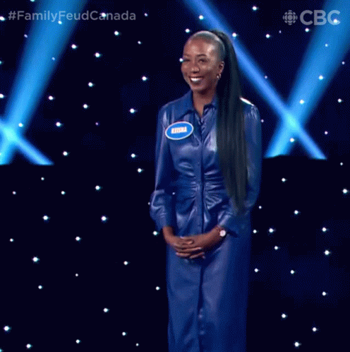 Standing And Smiling Family Feud Canada GIF - Standing And Smiling Family Feud Canada Family Feud GIFs