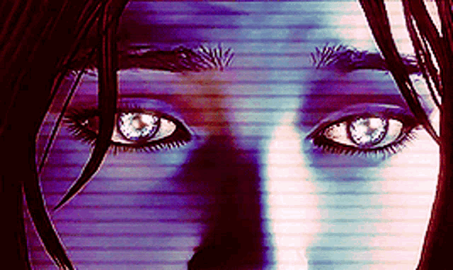 a close up of a woman 's face with a blue background