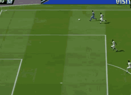 a soccer game is being played on a field with a ks logo on the sidelines