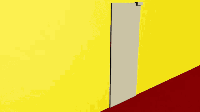 a yellow and red wall with a black door in the corner