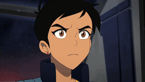 a close up of a cartoon character 's face with an angry look on her face